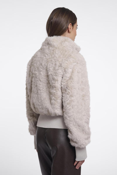 Short jacket with button closu