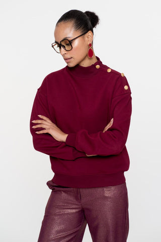 Sweater with buttons at shoul